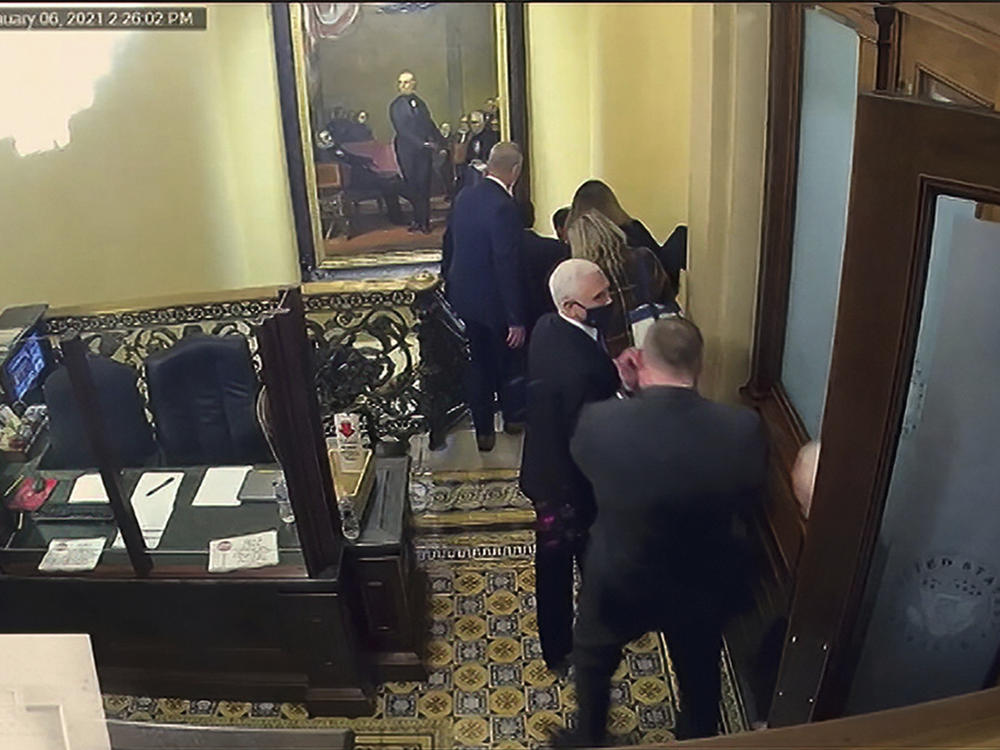 A security video shows then-Vice President Mike Pence being evacuated as rioters breach the Capitol on Jan. 6.