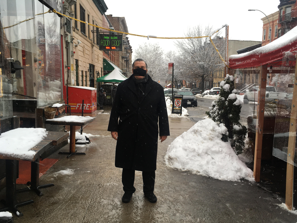 Owner Donald Minerva outside Scottadito Osteria Toscana restaurant in Brooklyn, N.Y., which has been closed for indoor dining for two months. The restaurant is reopening at reduced capacity on Valentine's weekend.