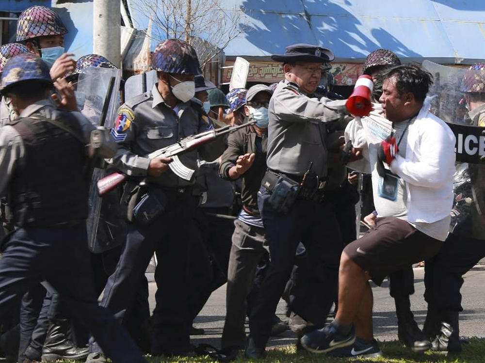 Police arrest a protester during a demonstration against the military coup in Mawlamyine, in Myanmar's Mon State, on Friday.
