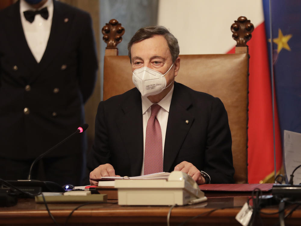 New Italian Prime Minister Mario Draghi presides over a meeting of his first cabinet in Rome Saturday.
