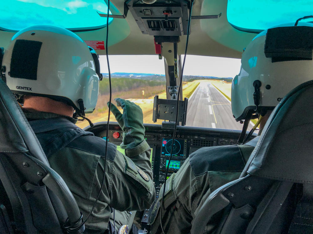 Pilots Jerry Griffin (L) of the Birmingham Police Department and Jonathan Johnson of the Jefferson County Sheriff's Office conduct a helicopter training flight using new virtual reality technology.