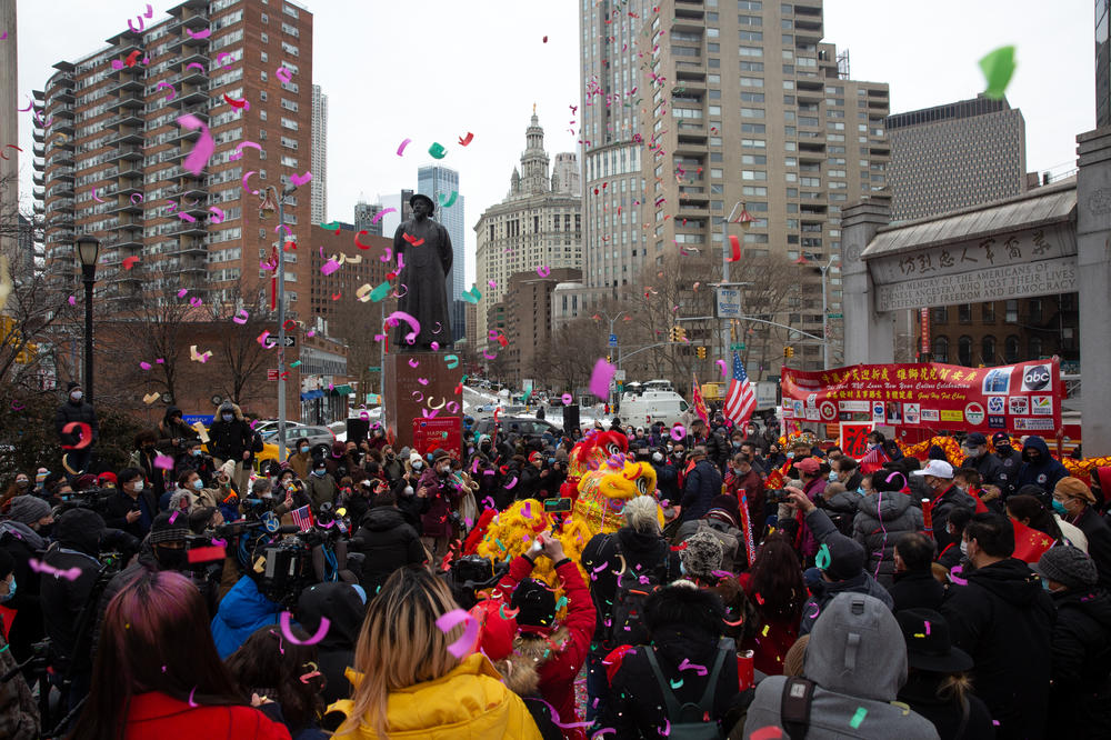 Confetti rains down a celebration organized by Better Chinatown USA in American Legion Kimlau Memorial Square on Friday.