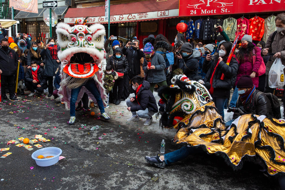 The Chinatown Community Young Lions perform lion dancing during the Lunar New Year festivities.