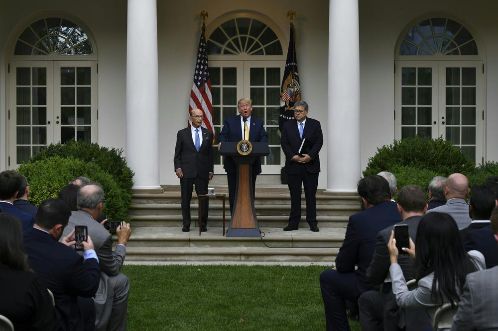 At the 2019 White House Rose Garden announcement of an executive order for citizenship data, then-President Donald Trump was joined by then-Commerce Secretary Wilbur Ross (left) and then-U.S. Attorney General William Barr (right), who said the data 