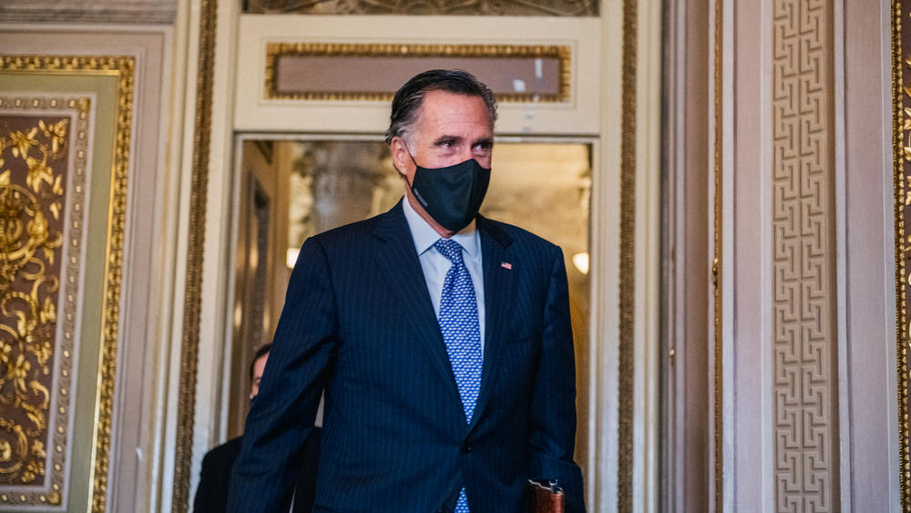 Sen. Mitt Romney, seen on the second day of Trump's impeachment trial, also voted to convict Trump in his first impeachment trial.