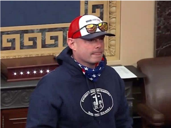 Federal prosecutors allege Leo Brent Bozell IV took part in the rioting at the U.S. Capitol on Jan. 6. The government says it identified him through his blue sweatshirt, which featured the logo for a small Christian school in Pennsylvania that witnesses say his children attended.