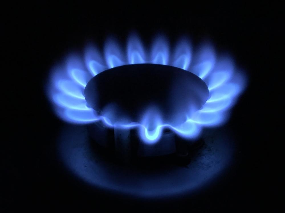 A lower-carbon natural gas flame burns on a stovetop at a NW Natural testing facility.