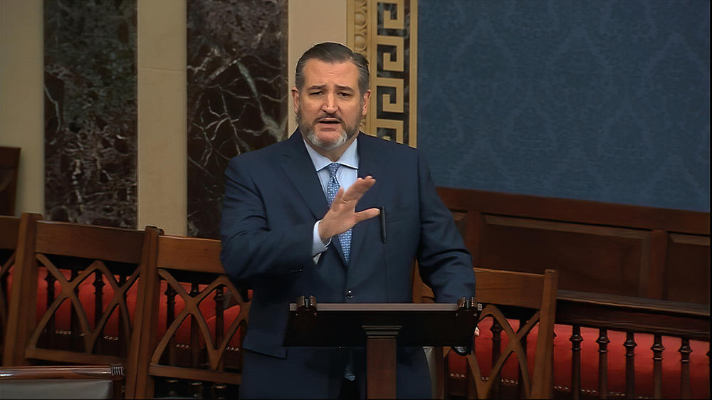 The Texas Democratic Party is calling for the resignation of Sen. Ted Cruz, seen here on the Senate floor on Feb. 4, after the Republican lawmaker went on a family trip to Mexico in the middle of Texas' deadly winter storm.