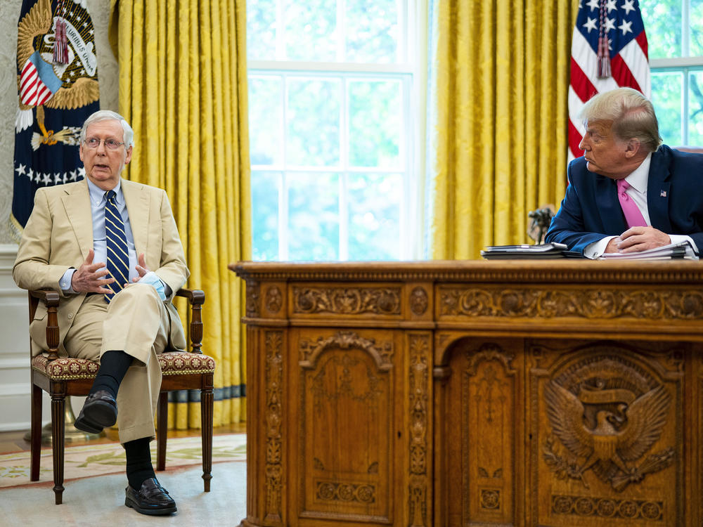 The divide between Republican Senate leader Mitch McConnell and former President Donald Trump, seen here in the Oval Office in July 2020, is a symptom of something that's been brewing since long before the Trump era.