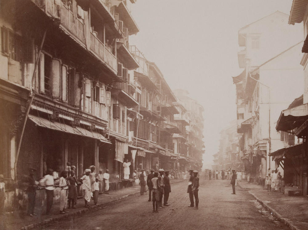Borah Bazaar Street in Bombay in 1875, decades before bubonic plague struck and led to a dramatic urban makeover.