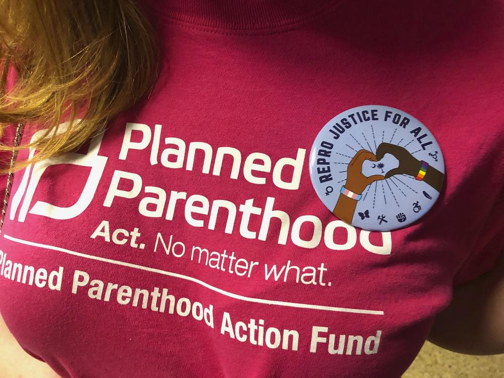 The bill, which was signed on Thursday, would prohibit abortion as soon as cardiac activity can be detected with an ultrasound, except in cases of rape, incest or when a mother's life is in danger.