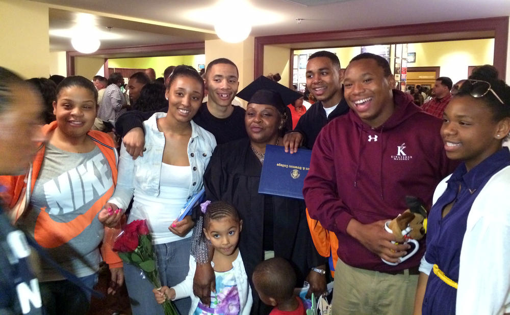 Diane Butler surrounded by grandchildren and great-grandchildren at her graduation ceremony from Bryant & Stratton College, 2013. Butler died in Milwaukee on Dec. 4, 2020. She was 66.