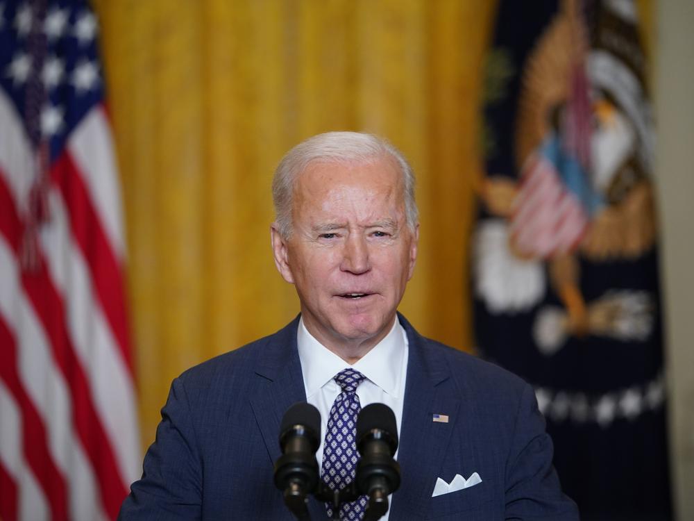 President Biden speaks from the East Room of the White House to virtually address the Munich Security Conference in Germany on Friday.
