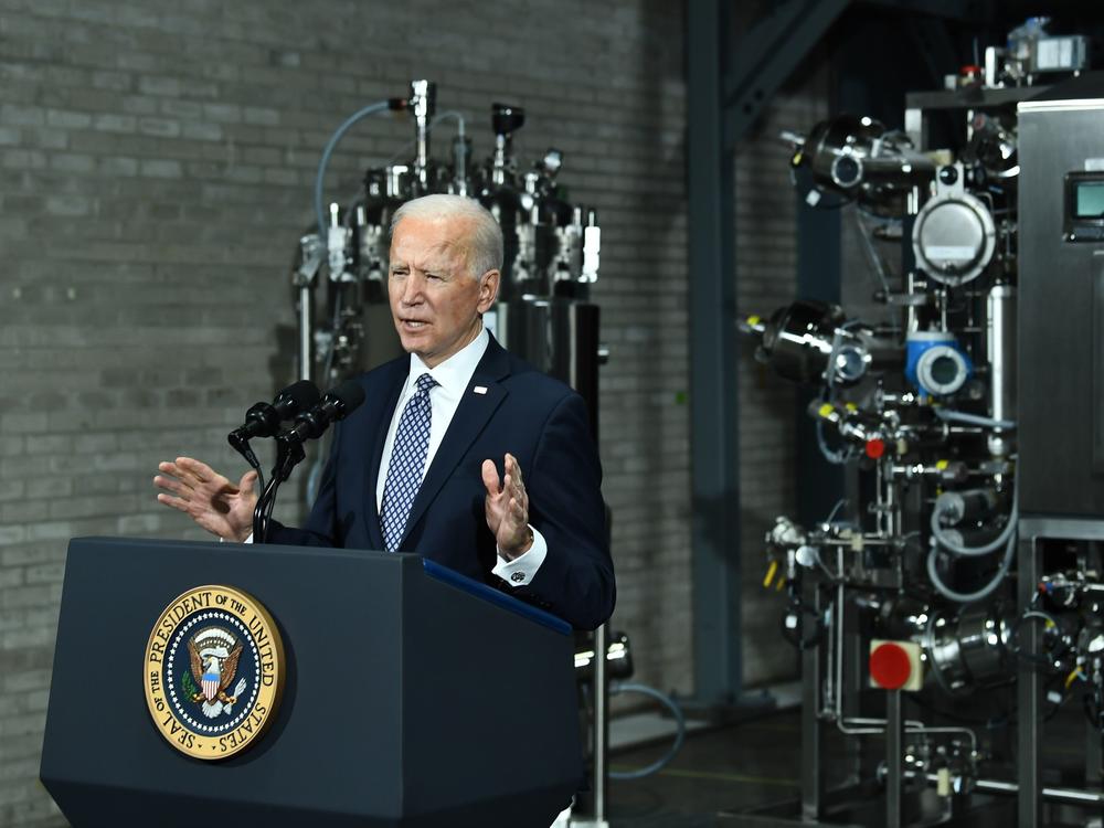 President Biden speaks Friday at a Pfizer COVID-19 vaccine manufacturing site in Portage, Mich. The House could pass a version of his $1.9 trillion COVID-19 relief legislation this week.