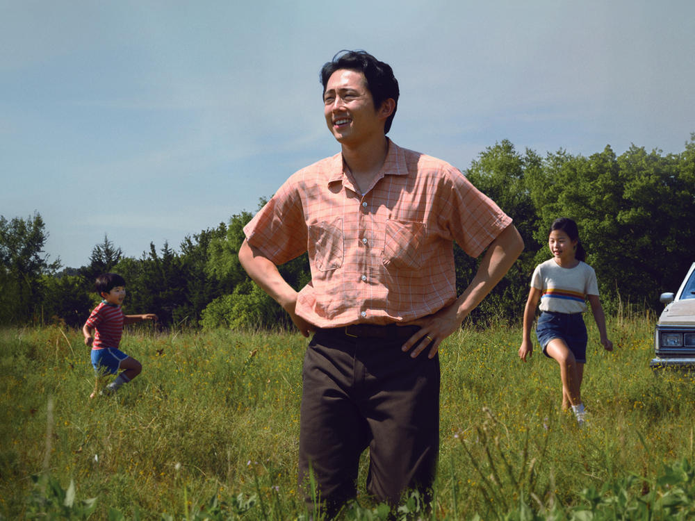 Jacob (Steven Yeun) moves his family from California to farm in rural Arkansas in <em>Minari</em>.