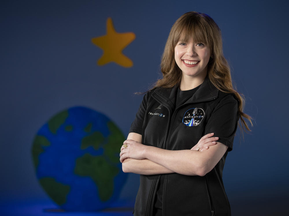 A photo provided by St. Jude Children's Research Hospital shows Hayley Arceneaux at the hospital in Memphis, Tenn. It announced on Monday that Arceneaux, a former patient and current employee, will be one of four crew members on the first all-civilian space flight this year.