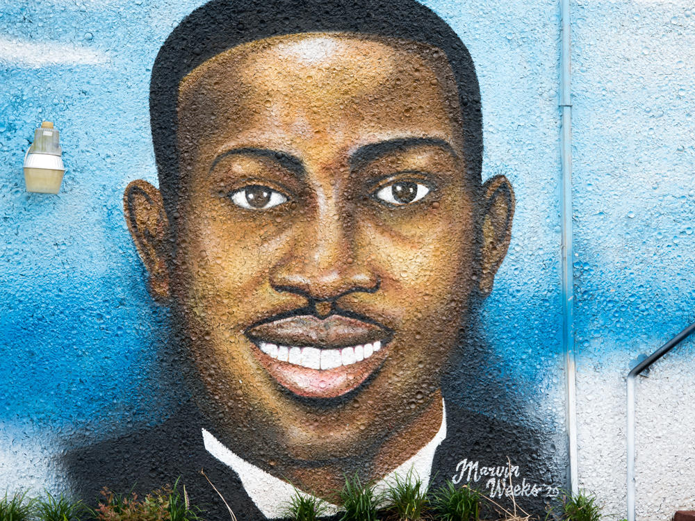 A mural depicting Ahmaud Arbery in July 2020 in Brunswick, Ga. Gregory McMichael, Travis McMichael and William 