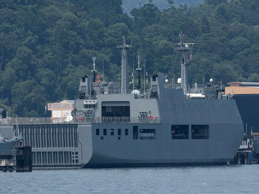 Myanmar vessel UMS Moattama, which was sent to return Myanmar migrants from Malaysia, is seen docked at a jetty outside Kuala Lumpur on Monday.