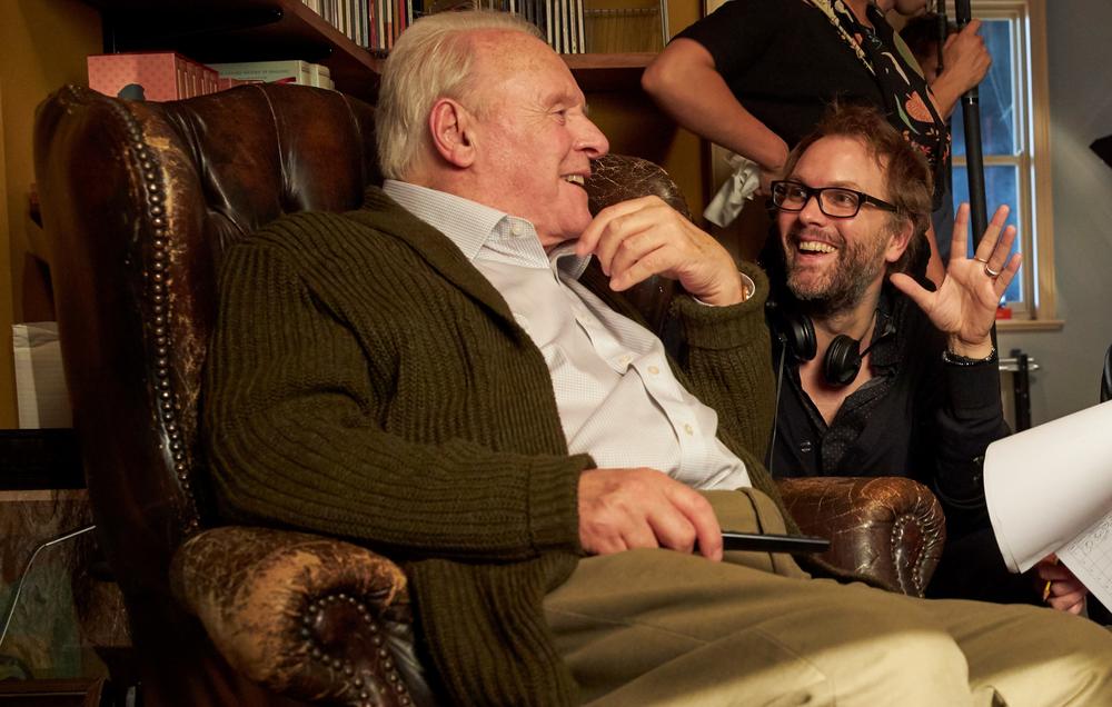 Hopkins talks with director Florian Zeller on set of <em>The Father.</em>