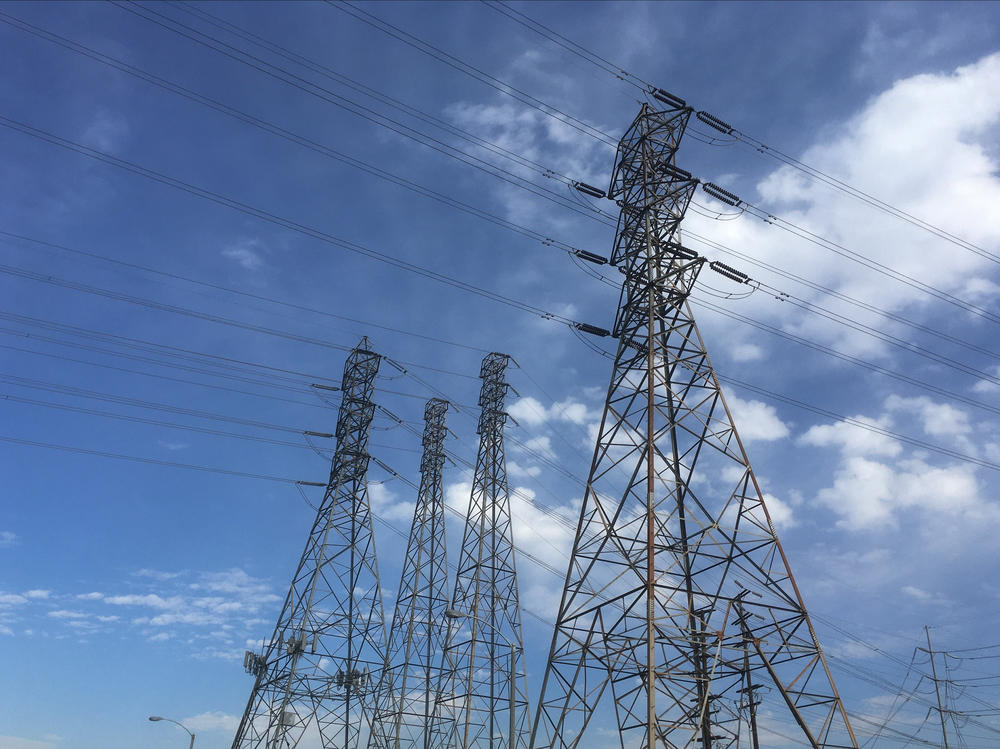 Electrical grid transmission towers in Pasadena, Calif. Major power outages from extreme weather have risen dramatically in the past two decades.