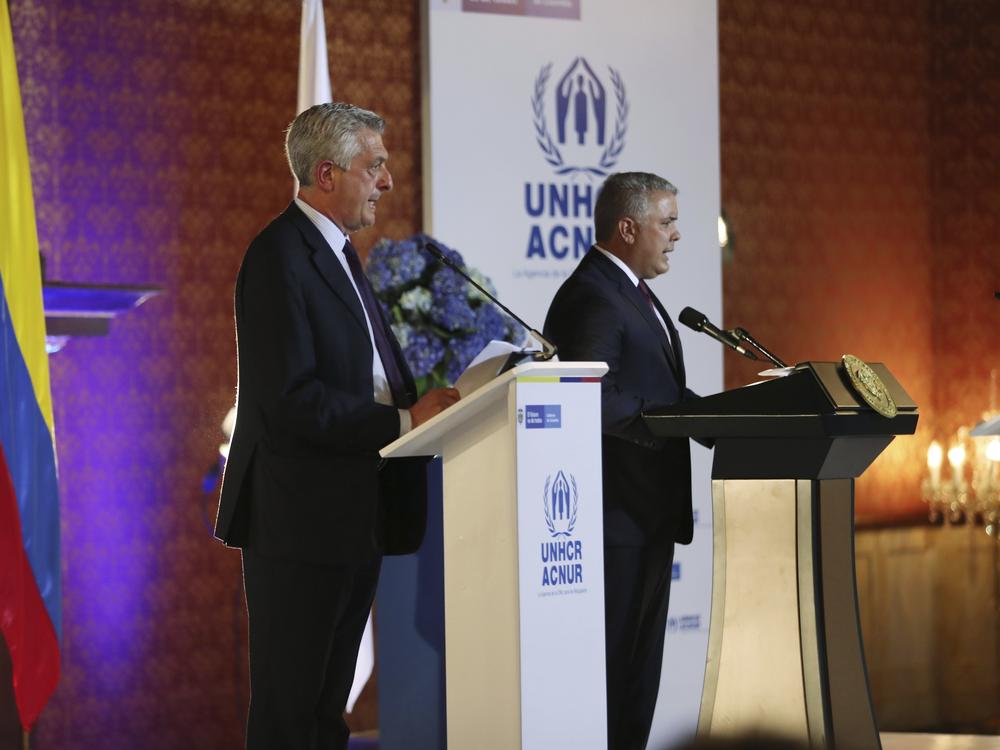 Filippo Grandi, the U.N. High Commissioner for Refugees (left) and Colombia's President Iván Duque speak in Bogotá, on Feb. 8. Grandi has called Colombia's open-door policy 