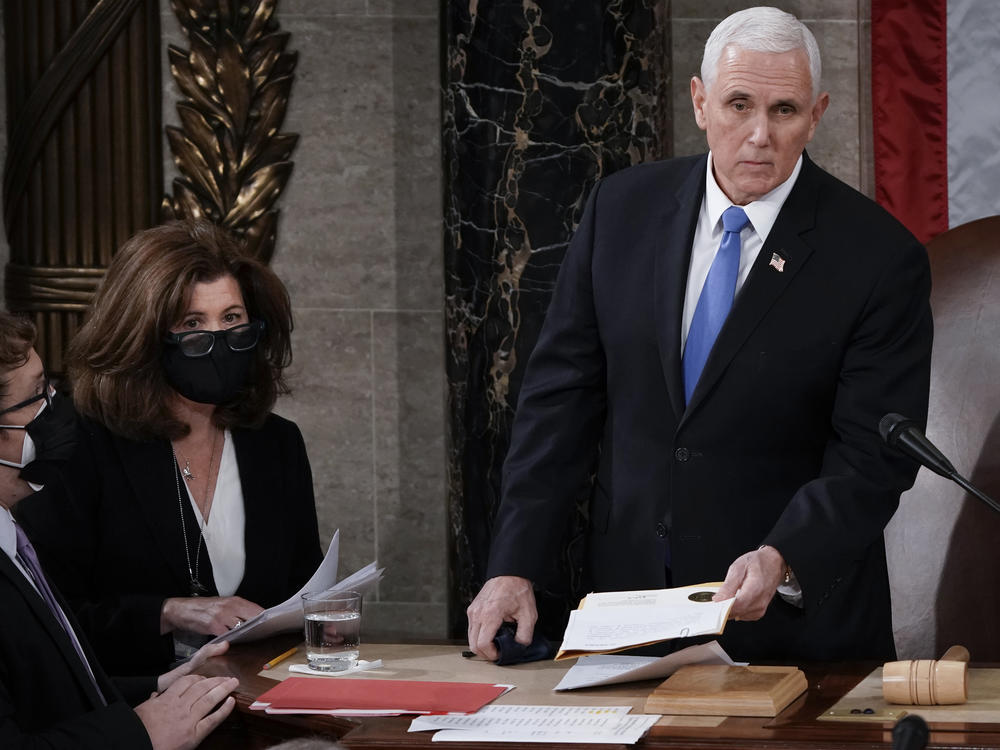 Senate parliamentarian Elizabeth MacDonough works beside then-Vice President Mike Pence earlier this year during the certification of 2020 Electoral College ballots, in the House chamber of the U.S. Capitol.