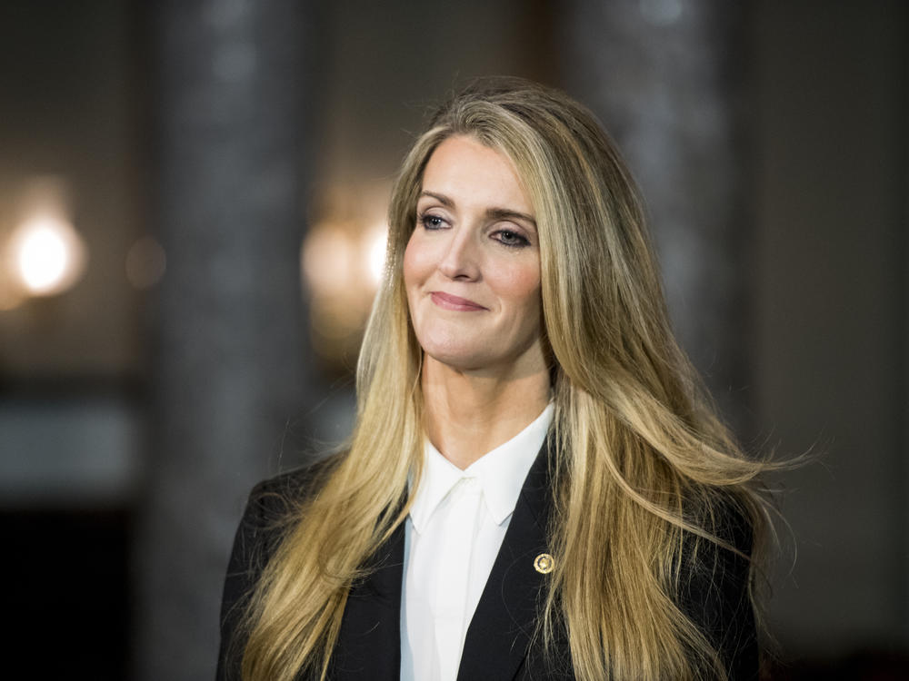 Former Sen. Kelly Loeffler, R-Ga., waits for Vice President Mike Pence to arrive for her swearing-in reenactment for the cameras in the Capitol in January 2020.