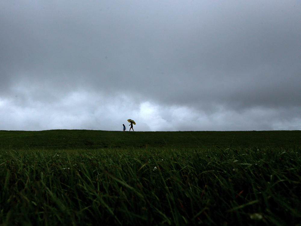 Storm clouds gather above the levee near Lake Pontchartrain as Tropical Storm Cristobal makes landfall on June 07, 2020 in New Orleans.