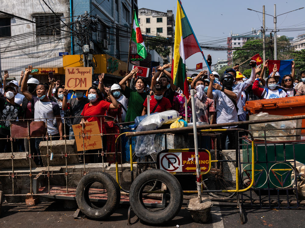 Anti-coup protesters in Yangon, Myanmar. Myanmar's military government has intensified a crackdown on protesters in recent days, using tear gas, charging at and arresting protesters and journalists.