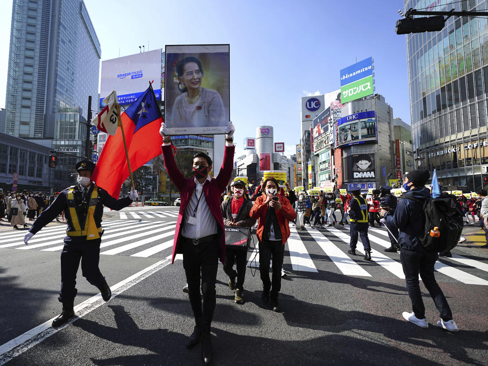 Myanmar people and supporters march during on Feb. 14 in Tokyo to protest the military coup.