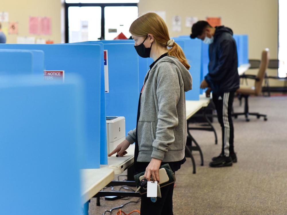 Georgia voters cast their ballots in Chamblee for runoff elections in early January. Georgia's Republican lawmakers have proposed a number of changes to cut down on voting options.