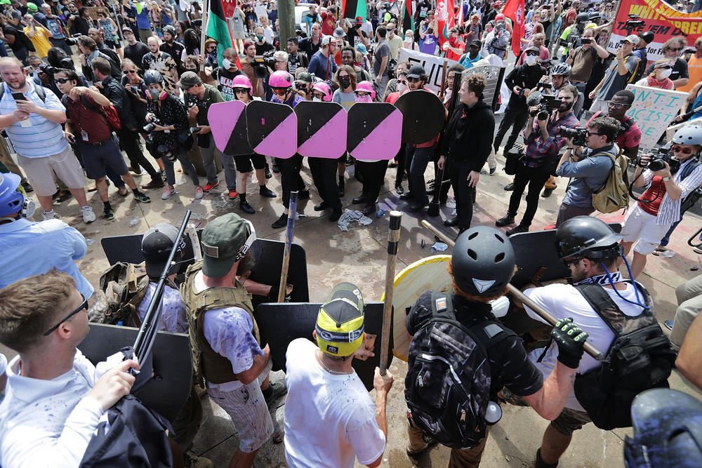 Far-right demonstrators and counterprotesters face off at the entrance to Emancipation Park (now named Market Street Park) in Charlottesville, Va., during the Unite the Right rally in August 2017.