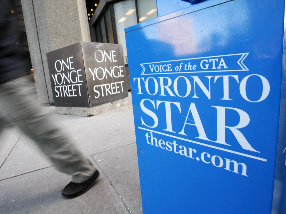 A <em>Toronto Star</em> newspaper box is seen here in front of the newspaper's Toronto offices. Torstar, the newspaper's owner, says it plans to enter the online gaming business to support its journalism.