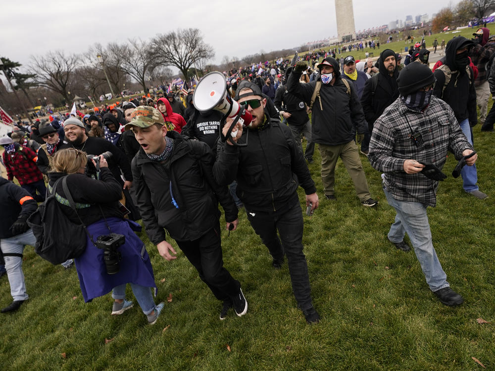 Ethan Nordean, with bullhorn, leads members of the far-right group Proud Boys before the riot at the U.S. Capitol on Jan. 6. The self-described sergeant-at-arms of the Seattle Proud Boys is facing federal charges over his role in the attack.