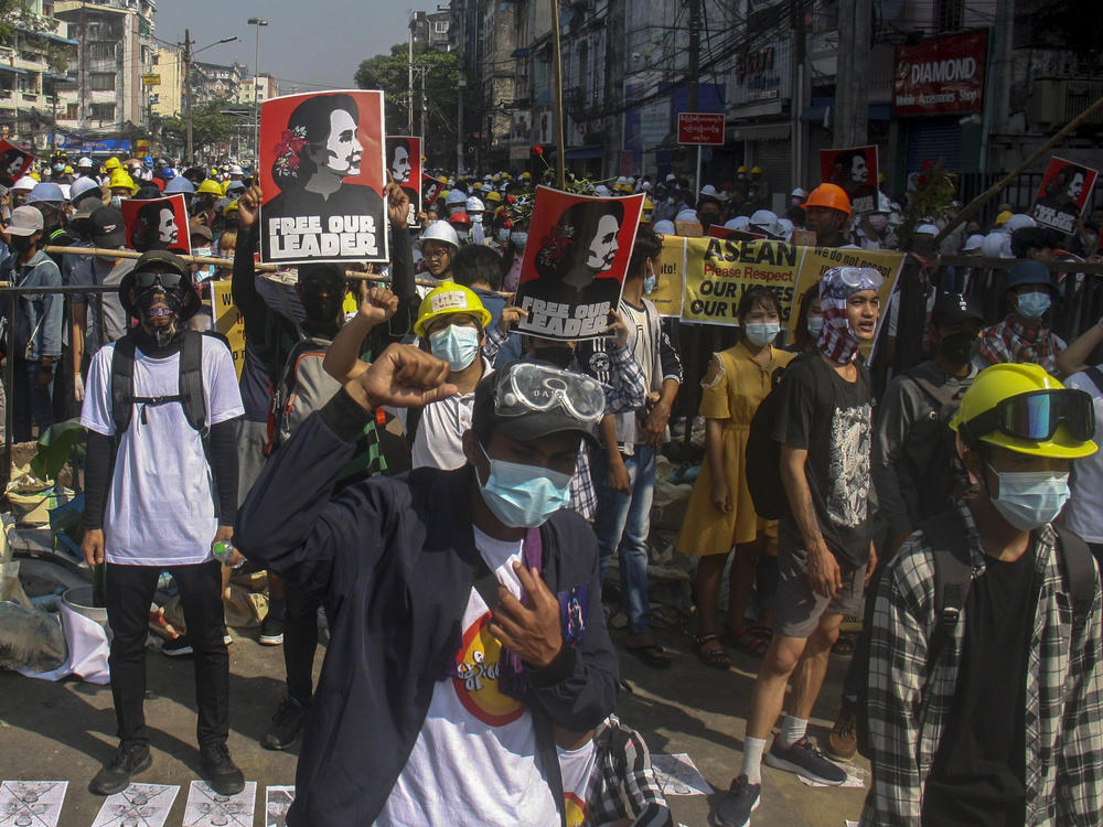 Crowds gather in Yangon, Myanmar, Tuesday to protest the military coup. Police used tear gas and rubber bullets to disperse the crowds. Just two days earlier the military killed at least 18 people and wounded more than 30 after firing into the crowds with live ammunition.