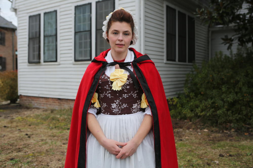 Nicole Brown, a William & Mary graduate student and actor-interpreter for Colonial Williamsburg, is in costume as Bray school teacher, Ann Wager.