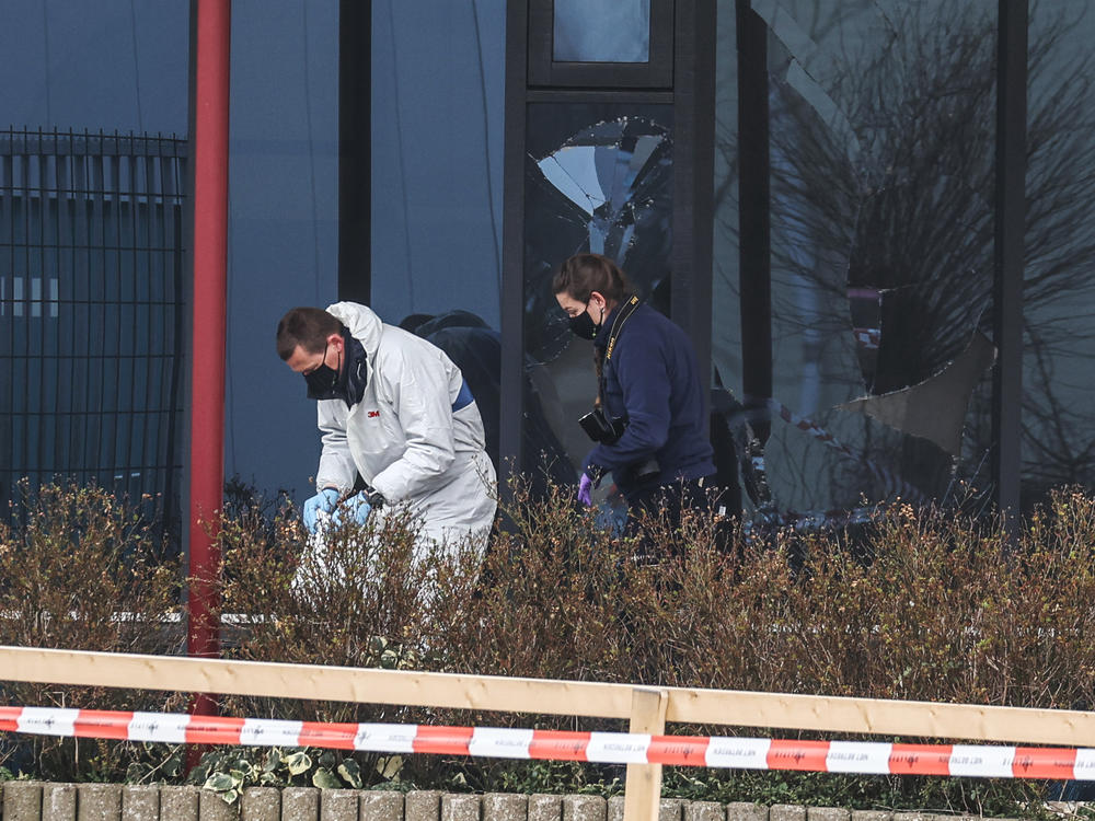 Forensic investigators search for evidence after an explosion on Wednesday at a coronavirus testing center in the town of Bovenkarpsel, The Netherlands.