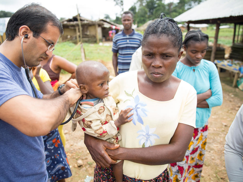Dr. Raj Panjabi, the newly named head of the President's Malaria Initiative, treating patients during a visit to Liberia, where he was born and lived until 1990. He'll lead the effort to prevent and treat malaria around the world. Each year, some 400,000 people die of a disease that, he notes, is 