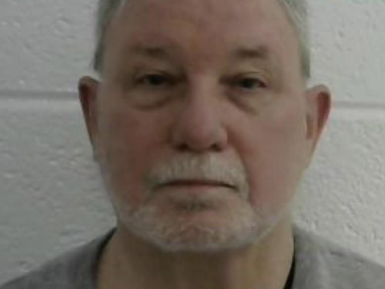 Former Laurel, Md., police chief David Crawford is under arrest, facing dozens of criminal charges related to a string of arson attacks on homes and garages.