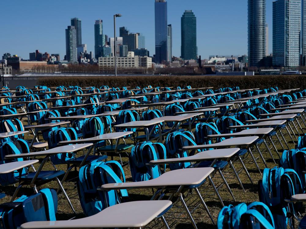 School desks make up an exhibit called 