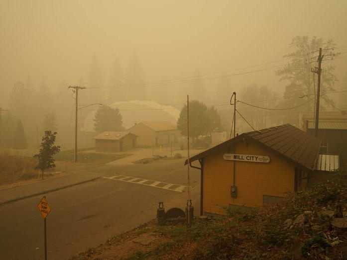 Smoke blankets Mill City, Ore., which was evacuated for days last fall following the nearby Beachie Creek Fire.