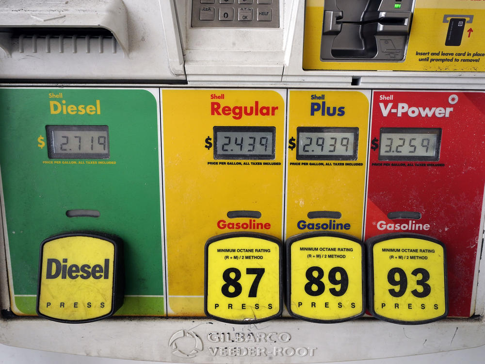 Gasoline and diesel prices are displayed on a pump at a gas station on Feb. 18 in Westwood, Mass. Oil companies have responded to investor demand by being disciplined about their crude production. Whether that will remain the case over the long term is uncertain.