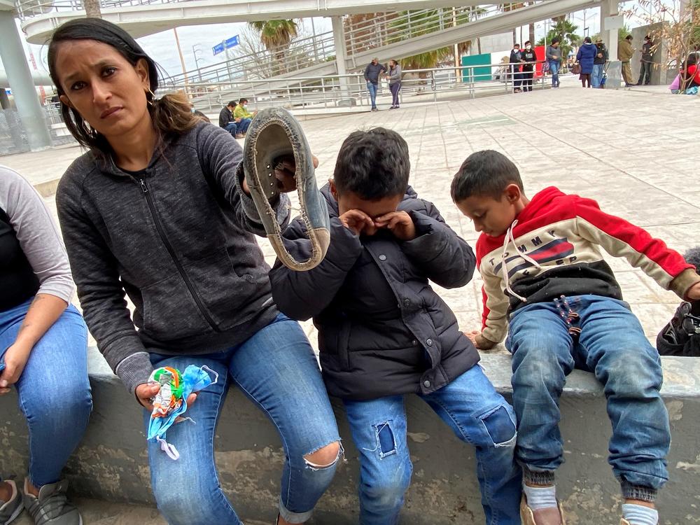Iris Coto is stranded in Reynosa after she and her two twins, Justin and David, were expelled from Hidalgo, Texas, after they crossed illegally seeking asylum. Justin Coto, 10, from El Salvador, wore out the sole of his sneaker on the journey north with his twin brother and mother to the U.S. border.