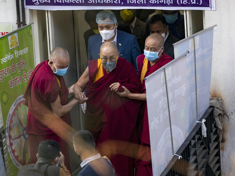 The Dalai Lama leaves the Zonal Hospital in Dharmsala, India, on Saturday after receiving the COVID-19 vaccine.