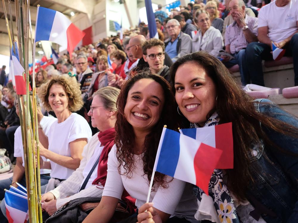 People wave French flags during the last meeting of pro-France loyalists opposing New Caledonia's self-determination referendum, in Nouméa in October.