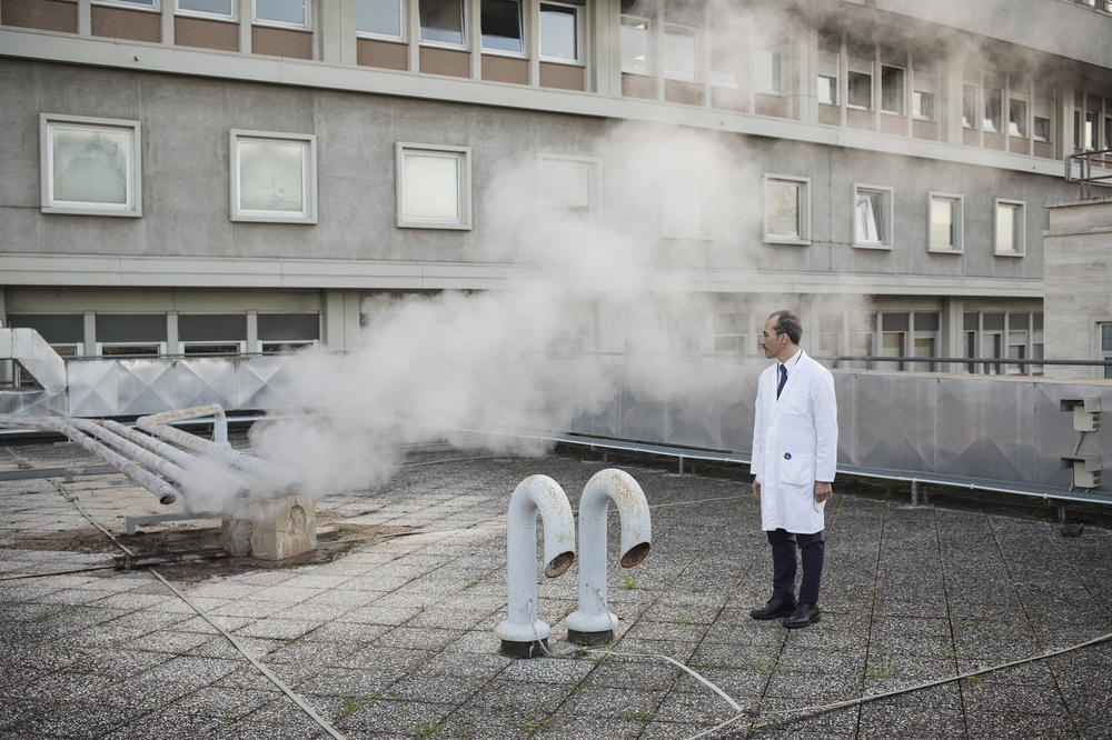 Psychiatrist Maurizio Pompili stands on the roof of Sant'Andrea hospital, where he works in Rome. The pandemic has unleashed 