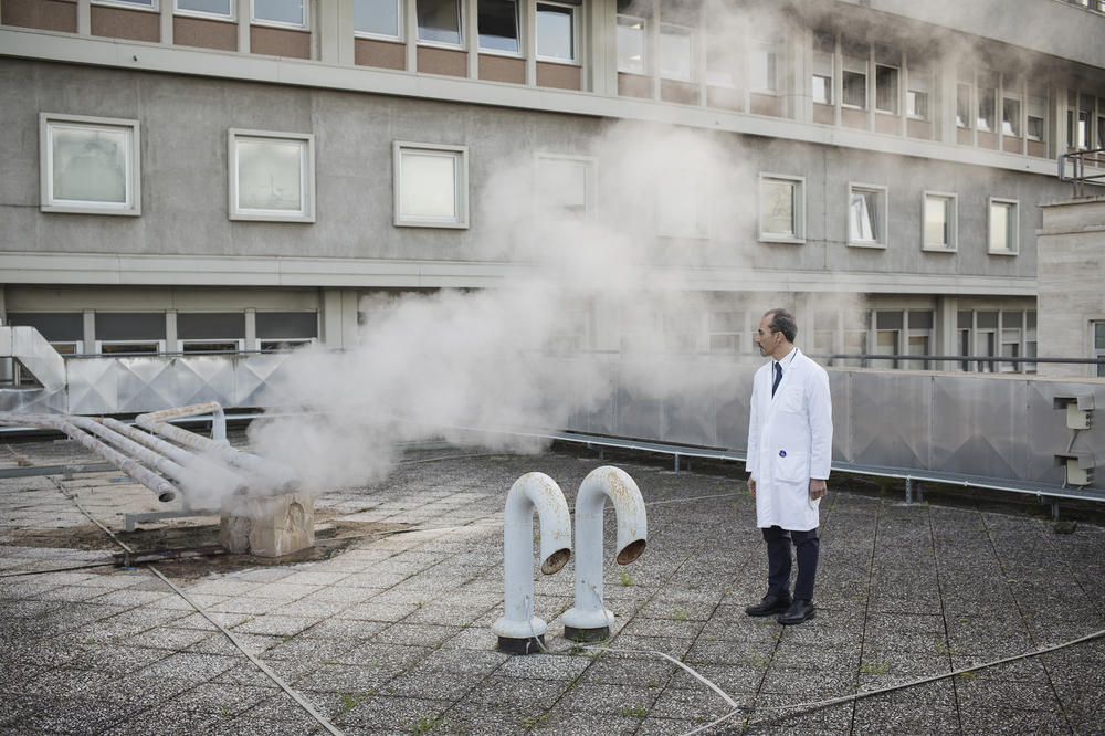 Psychiatrist Maurizio Pompili stands on the roof of Sant'Andrea hospital, where he works in Rome. The pandemic has unleashed 