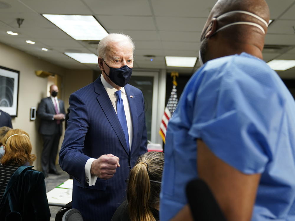 President Biden talks to recently vaccinated Army Staff Sgt. Marvin Cornish as he visits a COVID-19 vaccination site at the VA Medical Center in Washington, D.C., on Monday.