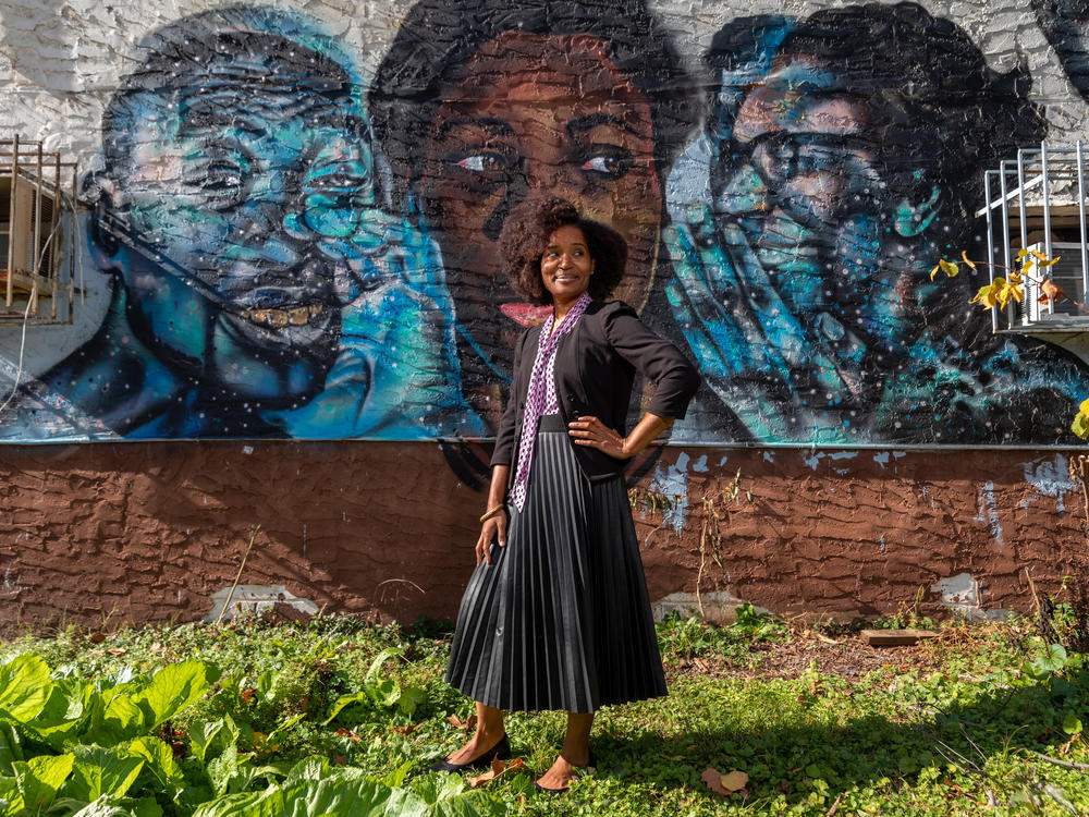 Keitra Bates stands outside of the original location of Marddy's in Atlanta. It's a shared kitchen where home cooks can prepare their goods, and collectively market them.