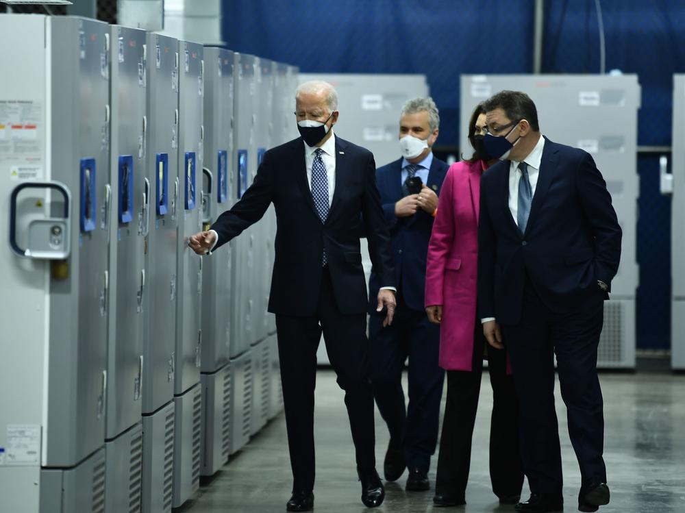 President Biden inspects COVID-19 vaccine freezers at a Pfizer plant in Kalamazoo, Mich., with White House Coronavirus Response Coordinator Jeffrey Zients, Michigan Gov. Gretchen Whitmer and Pfizer CEO Albert Bourla on Feb. 19.